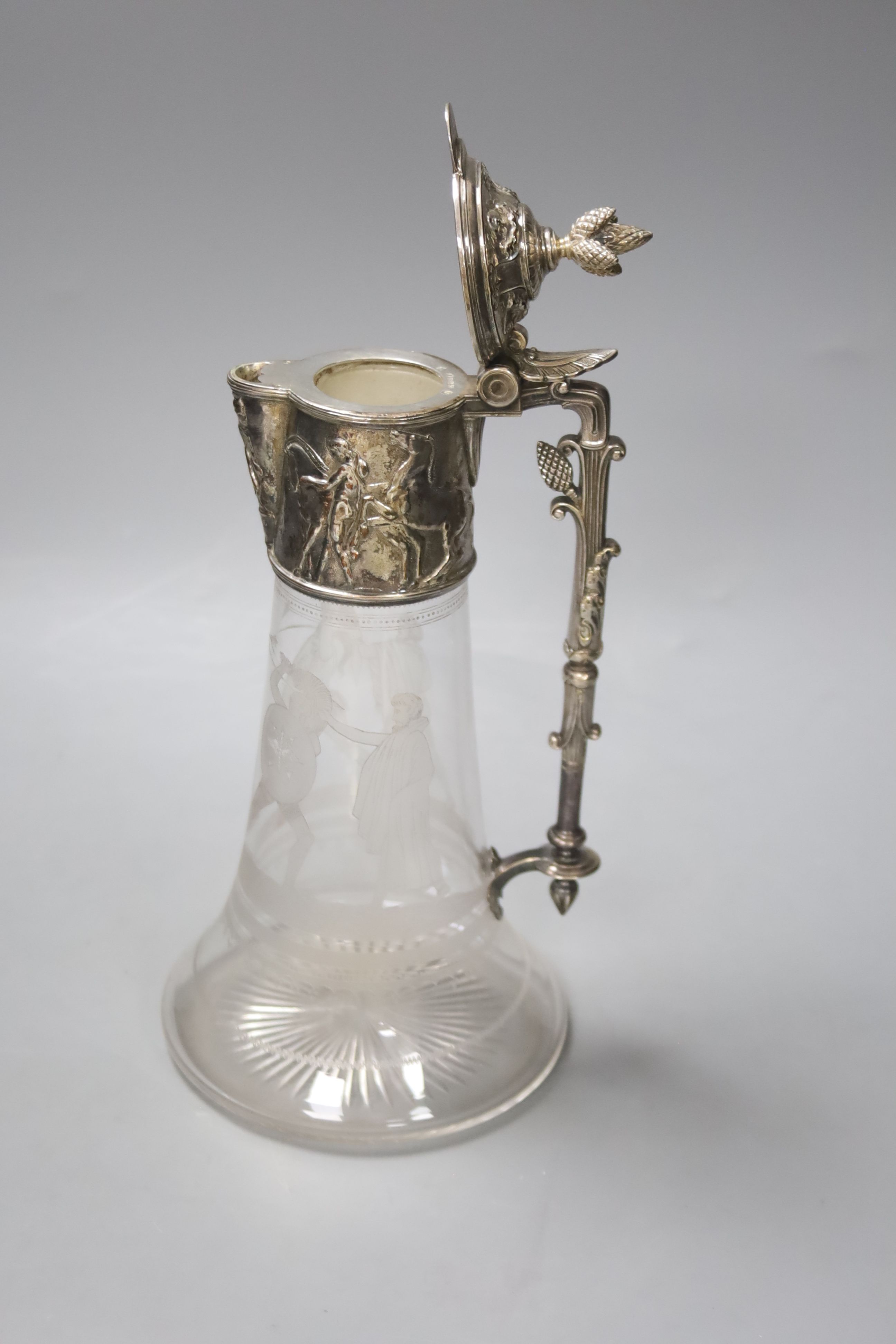 A late Victorian electroplate mounted etched glass claret jug
